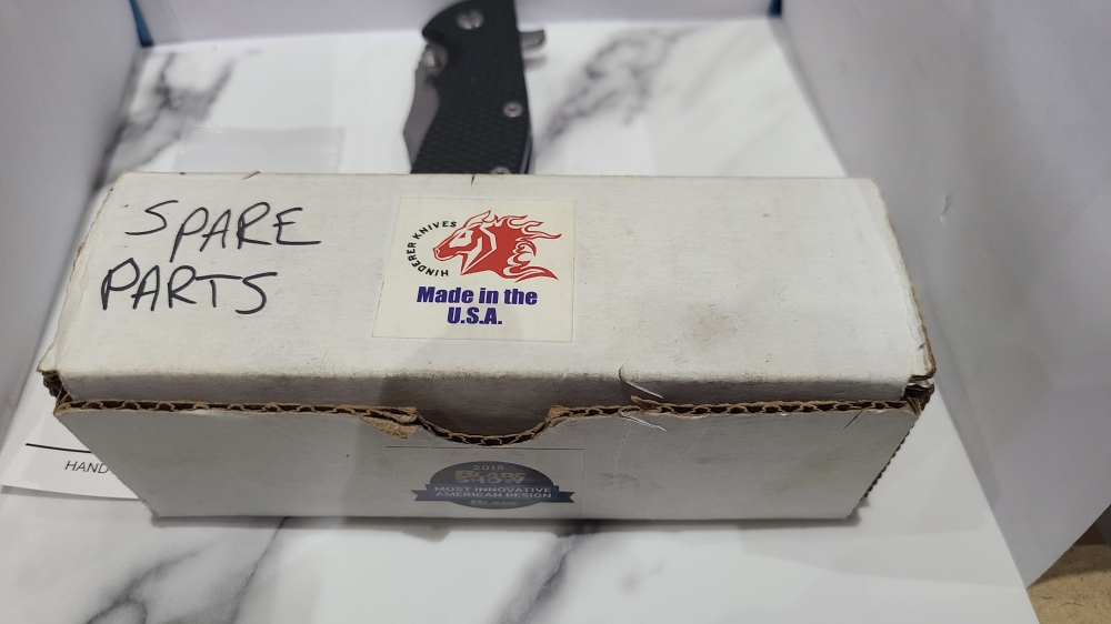 Hinderer XM-24 Bowie. Stonewashed blade with Blue titanium and Black G10 Scales.