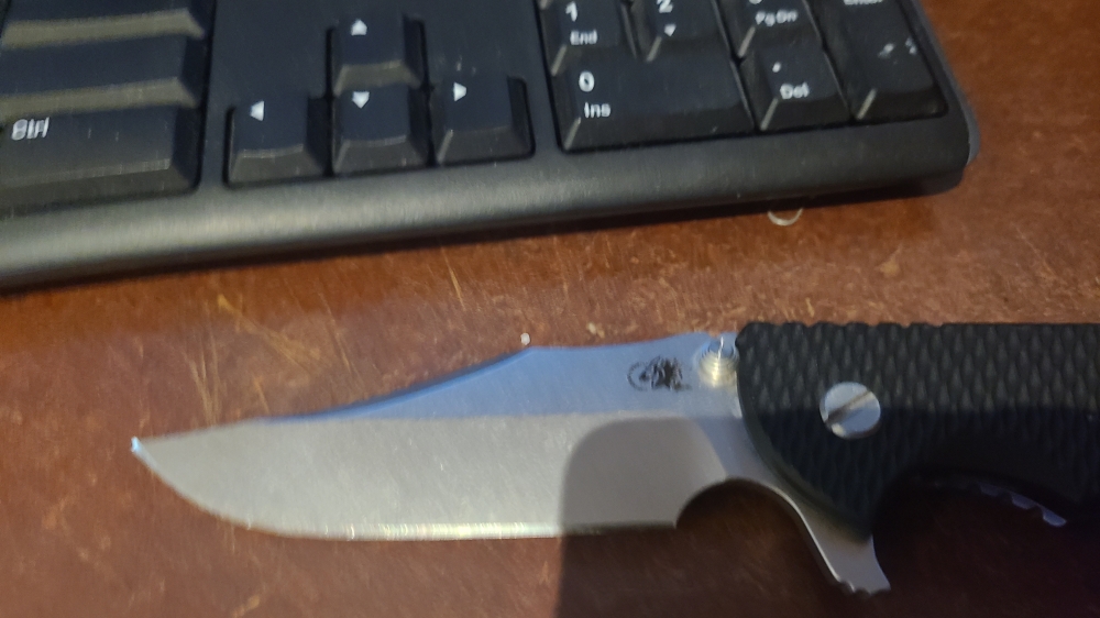 Hinderer XM-24 Bowie. Stonewashed blade with Blue titanium and Black G10 Scales.