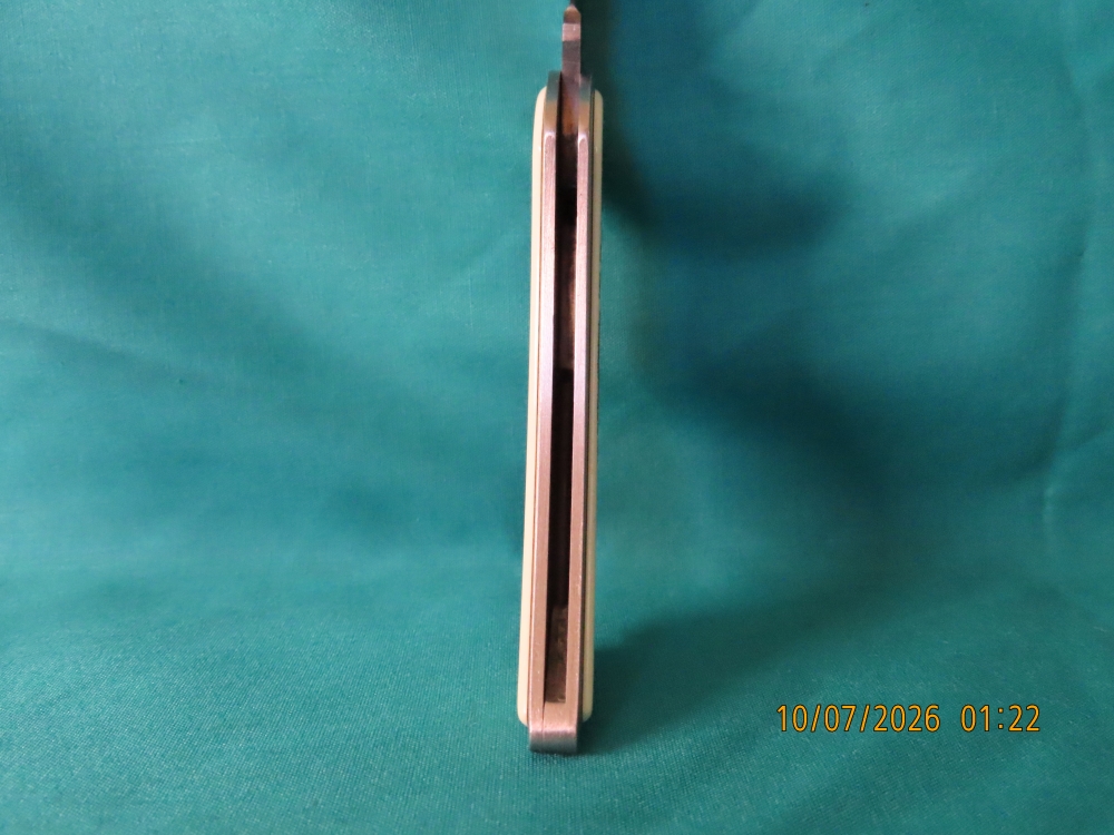 ZIPPO KNIFE, 'SCRIMSHAW SERIE'S, LIGHTHOUSE / SAILING SHIP