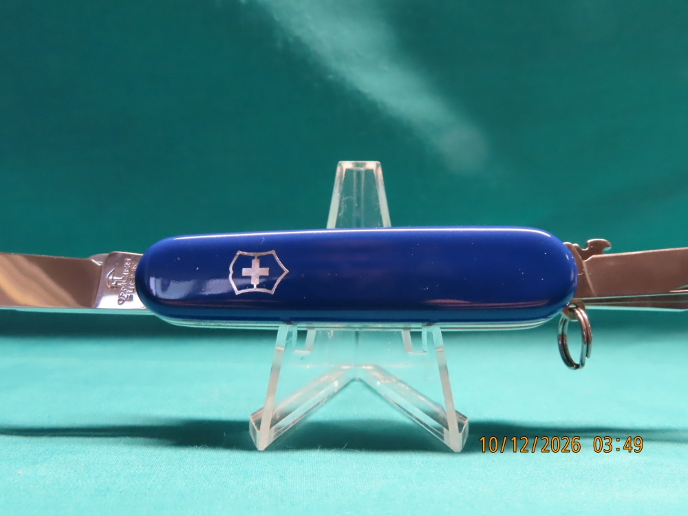 NIB, VICTORINOX SWISS ARMY KNIFE OFFICIER SUISSE, BLUE, ADVERTISING MERIT SWITZERLAND