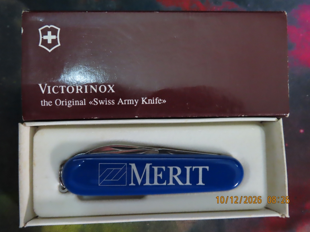 NIB, VICTORINOX SWISS ARMY KNIFE OFFICIER SUISSE, BLUE, ADVERTISING MERIT SWITZERLAND