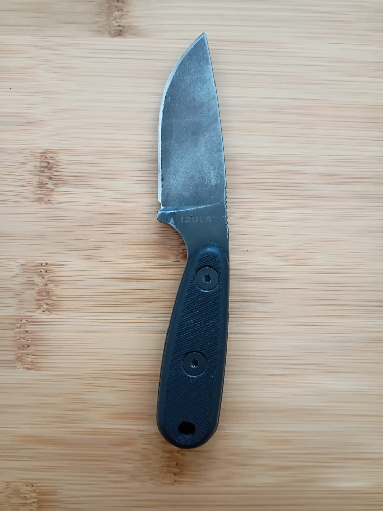 ESEE Izula black oxide finish with included G10 handle scales and MOLLE back