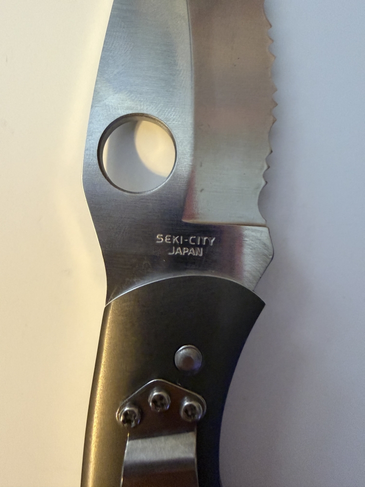 Vintage Spyderco Civilian C12TUFS 1st Gen Seki Japan  Rare 1st Generation Spyderco Civilian folder, circa 1992-1994, made in Seki-City, Japan. Discontinued Tufram-coated aluminum