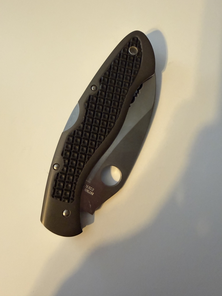Vintage Spyderco Civilian C12TUFS 1st Gen Seki Japan  Rare 1st Generation Spyderco Civilian folder, circa 1992-1994, made in Seki-City, Japan. Discontinued Tufram-coated aluminum