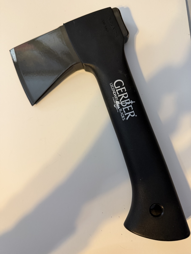 Vintage Gerber Back Paxe Hatchet Fiskars Finland 9\"  Rare first-generation vintage Gerber Back Paxe compact camp hatchet. Forged carbon steel head stamped FISKARS FINLAND; handle reads Gerber Legendary Blades, A Division of Fiskars Inc. 9 inches overall, 