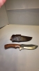 A fixed blade would handle D2 steel or 440C. Steel