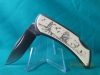 ZIPPO KNIFE, 'SCRIMSHAW SERIE'S, LIGHTHOUSE / SAILING SHIP
