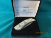 ZIPPO KNIFE, 'SCRIMSHAW SERIE'S, LIGHTHOUSE / SAILING SHIP