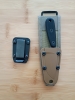 ESEE Izula black oxide finish with included G10 handle scales and MOLLE back