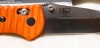 BENCHMADE 551 GRIPTILIAN in hard to find PUTMAN orange G10 scales with satin blade of 154CM