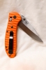 BENCHMADE 551 GRIPTILIAN in hard to find PUTMAN orange G10 scales with satin blade of 154CM