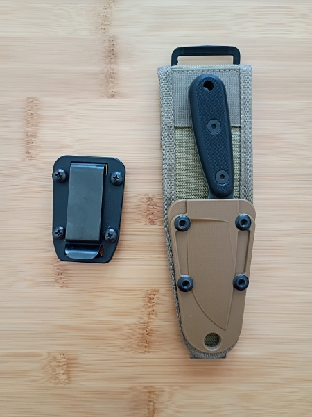 ESEE Izula black oxide finish with included G10 handle scales and MOLLE back