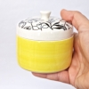 Porcelain trinket box - yellow body floral lid