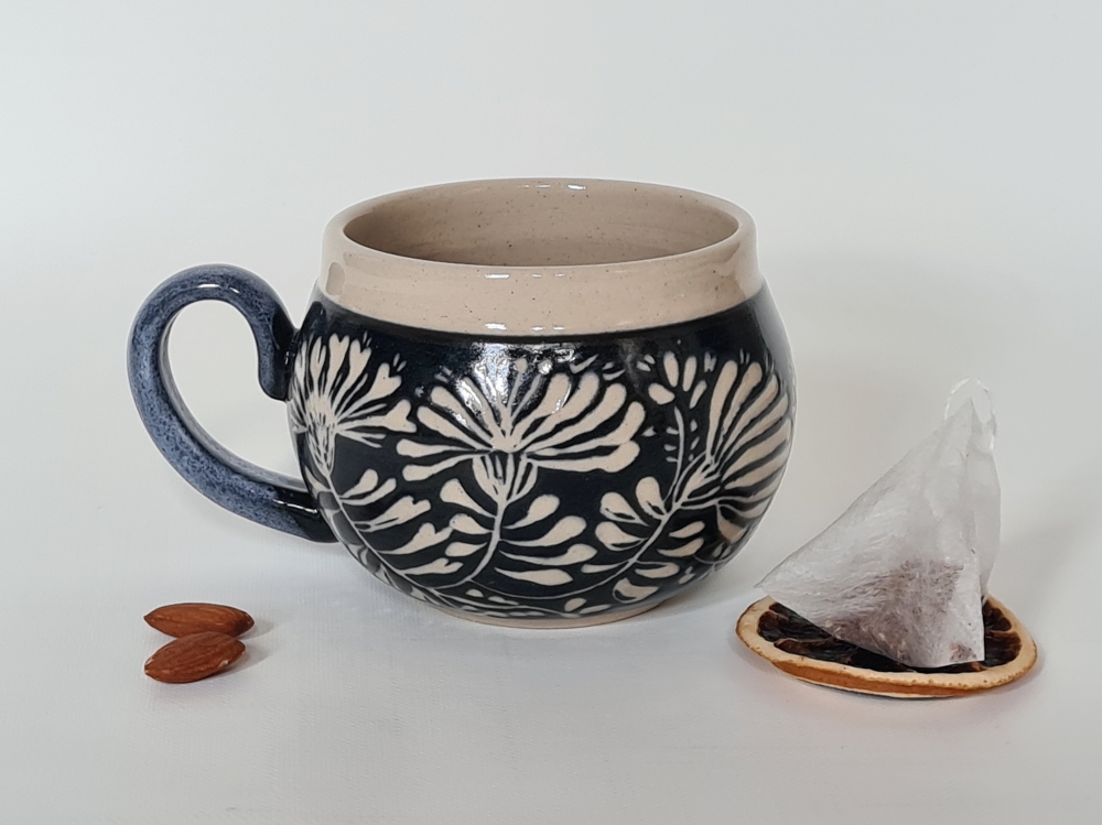 Floral sgraffito mug