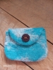 Monnaie en laine feutrée et cuir