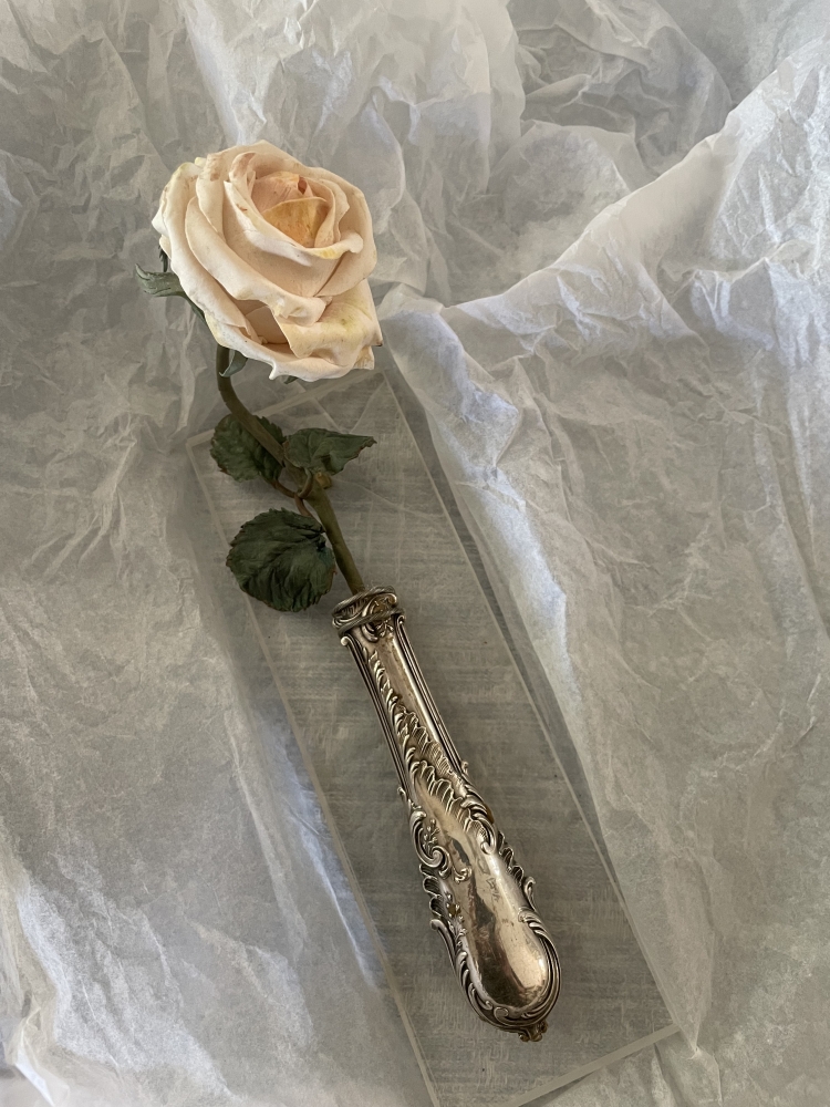 Manches en argent agrémenté d une rose