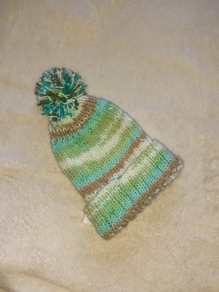 Bonnet pour enfant avec un pompon 