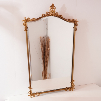 Miroir biseauté en métal doré vintage