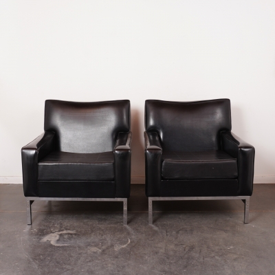 Paire de fauteuils simili cuir
