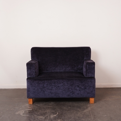 Fauteuil en velours bleu