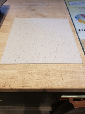 Carrelage beige moucheté