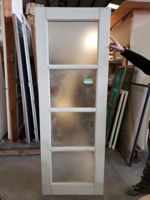 Porte vitrée suspendu en bois