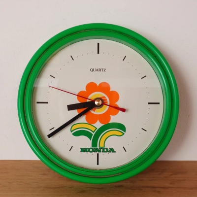 Horloge publicitaire murale vintage années 70-80