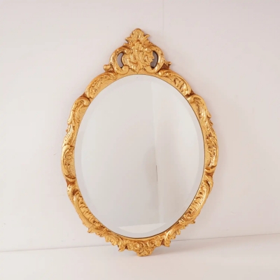 Miroir biseauté en bois doré vintage