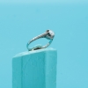 Anillo de compromiso en platino con diamante solitario de 0,50 ct