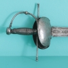 Espada de montar con guarnición de conchas e inscripción Enrique Coel, hacia 1700