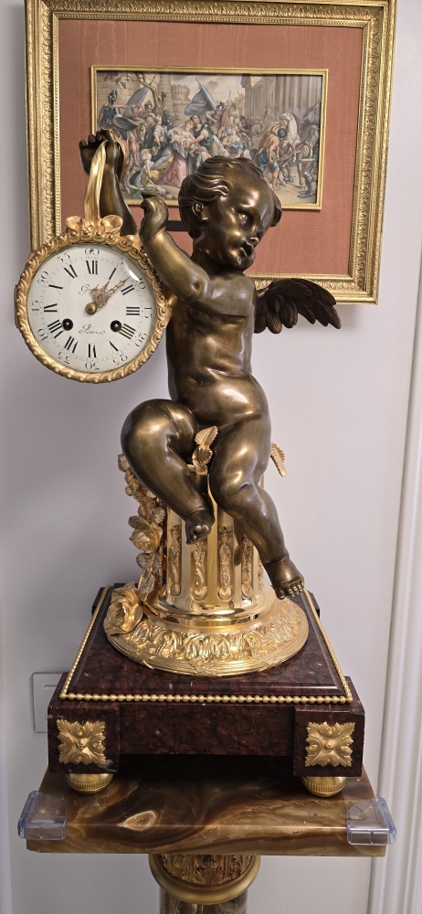 Reloj de sobremesa en bronce dorado y patinado, base de mármol, París, segunda mitad del siglo XIX