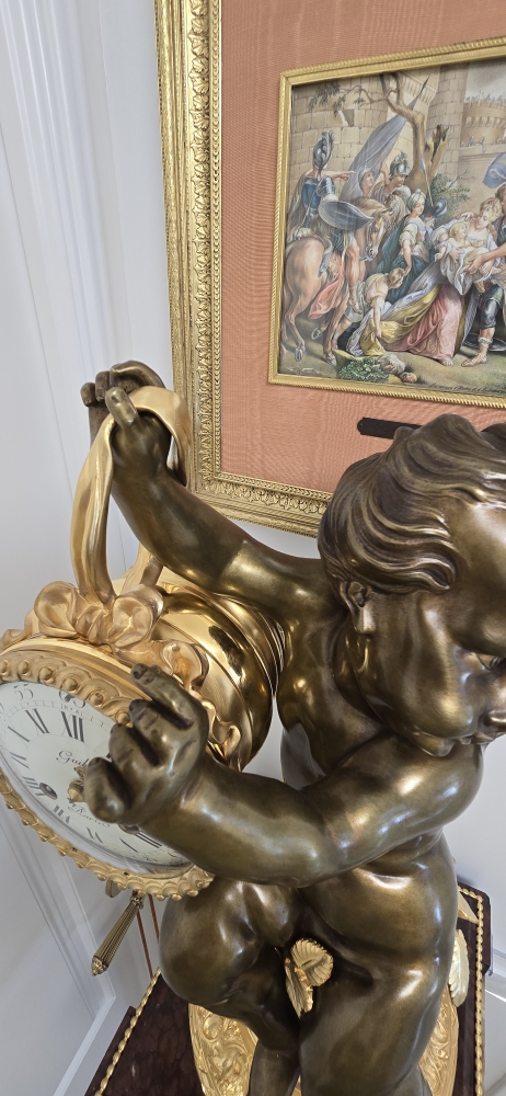 Reloj de sobremesa en bronce dorado y patinado, base de mármol, París, segunda mitad del siglo XIX