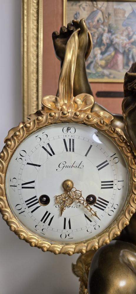 Reloj de sobremesa en bronce dorado y patinado, base de mármol, París, segunda mitad del siglo XIX
