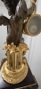 Reloj de sobremesa en bronce dorado y patinado, base de mármol, París, segunda mitad del siglo XIX