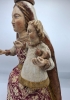  Virgen coronada con niño en madera policromada y tela con oros, siglo XIX
