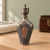 Biberón antiguo de peltre con figura de cobre, atribuido a China, XVIII / XIX.