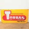 Chapa esmaltada de doble cara de Chocolates Torras, 1950 - 1959