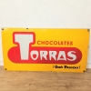 Chapa esmaltada de doble cara de Chocolates Torras, 1950 - 1959