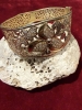 Brazalete de oro de 18 quilates con circonites 