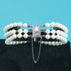 Pulsera Mikimoto de tres hileras de perlas cultivadas con cierre de plata