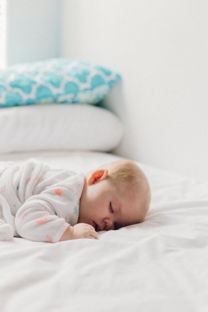 A cosy bed with soft pillows.
