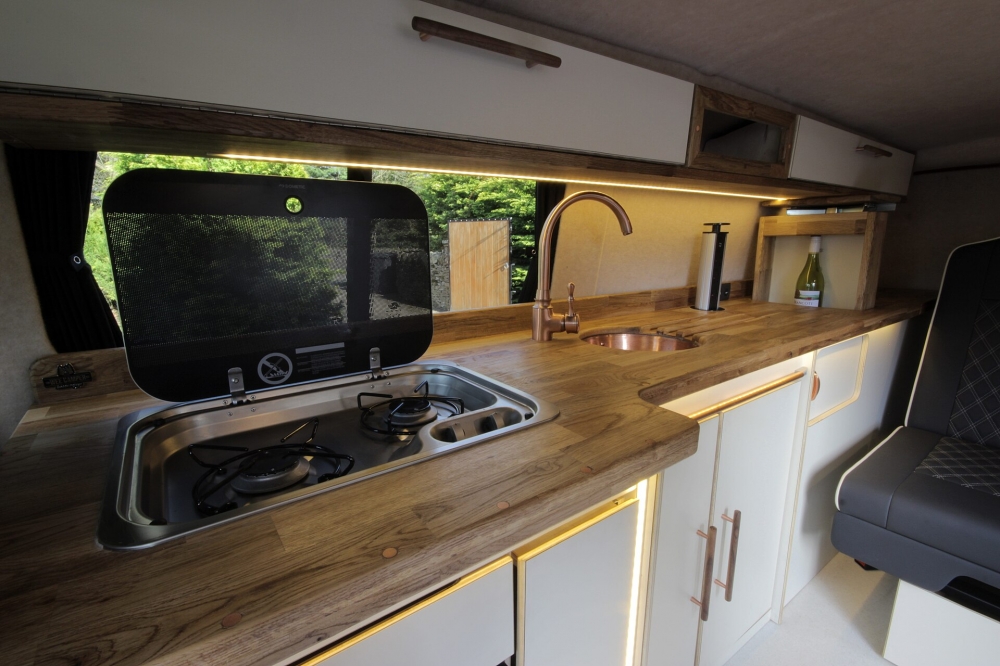 VW Transporter with a lounge and kitchen