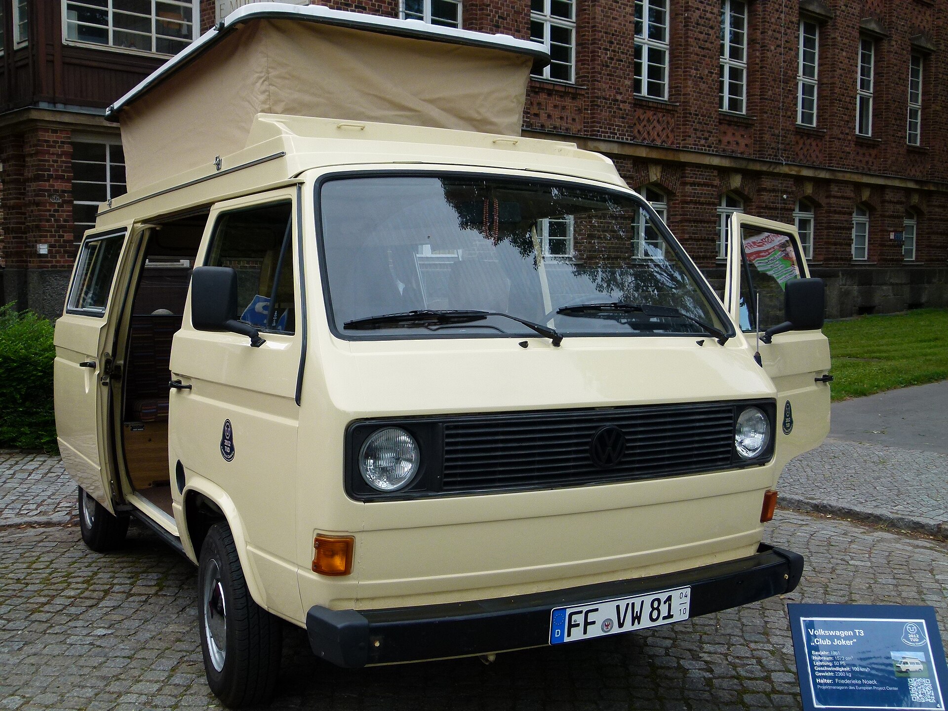 A cream Volkswagen T3 camper