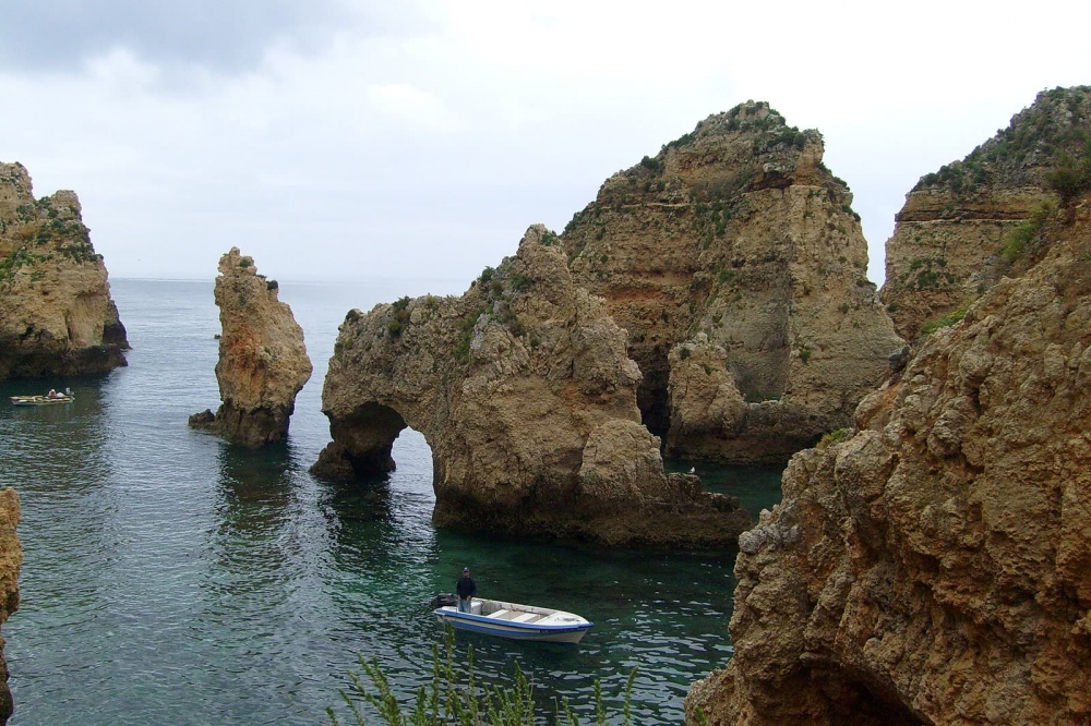 Ponta da Piedade grottoes by small boat